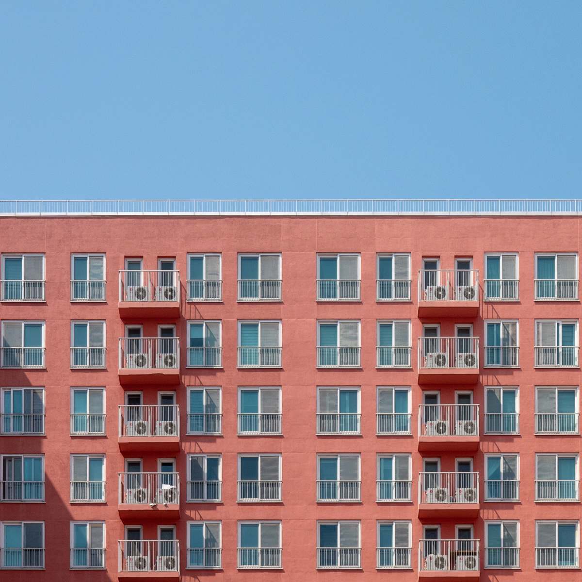 high rise brown high-rise building urban